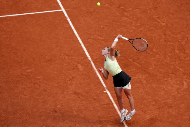 Poland's Maja Chwalinska serves to Russia's Mirra Andreeva during their women's final singles match on day 14 of the French Open tennis tournament on Court Philippe-Chatrier at the Roland-Garros Complex in Paris on June 6, 2026. (Photo by Dimitar DILKOFF / AFP)