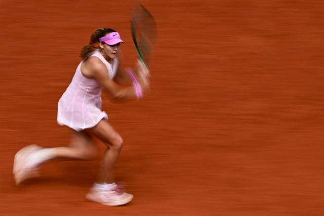 Russia's Mirra Andreeva plays against Poland's Maja Chwalinska during their women's final singles match on day 14 of the French Open tennis tournament on Court Philippe-Chatrier at the Roland-Garros Complex in Paris on June 6, 2026. (Photo by JULIEN DE ROSA / AFP)