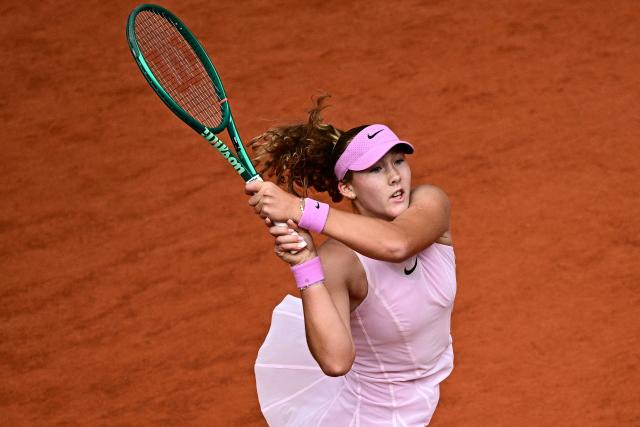Russia's Mirra Andreeva plays against Poland's Maja Chwalinska during their women's final singles match on day 14 of the French Open tennis tournament on Court Philippe-Chatrier at the Roland-Garros Complex in Paris on June 6, 2026. (Photo by JULIEN DE ROSA / AFP)