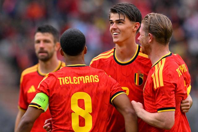 Belgium's forward #17 Charles De Ketelaere (C) celebrates with teammates after scoring a goal during the international friendly football match between Belgium and Tunisia at the King Baudouin Stadium in Brussels on June 6, 2026. (Photo by JOHN THYS / AFP)