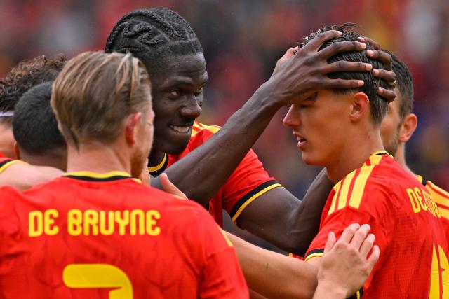 Belgium's forward #17 Charles De Ketelaere (R) celebrates with teammates after scoring a goal during the international friendly football match between Belgium and Tunisia at the King Baudouin Stadium in Brussels on June 6, 2026. (Photo by JOHN THYS / AFP)