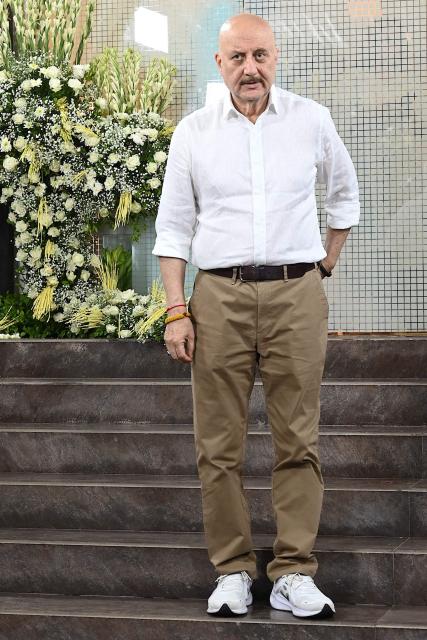Bollywood actor Anupam Kher leaves after offering funeral prayers for film producer Pahlaj Nihalani in Mumbai on June 6, 2026. (Photo by SUJIT JAISWAL / AFP)