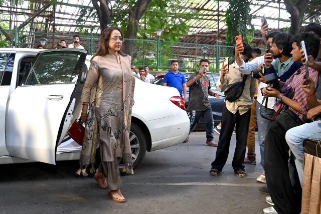 Bollywood actress Hema Malini arrives to offer funeral prayers for film producer Pahlaj Nihalani in Mumbai on June 6, 2026. (Photo by SUJIT JAISWAL / AFP)
