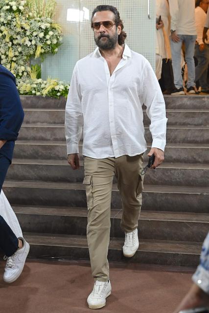 Bollywood actor Fardeen Khan leaves after offering funeral prayers for film producer Pahlaj Nihalani in Mumbai on June 6, 2026. (Photo by SUJIT JAISWAL / AFP)