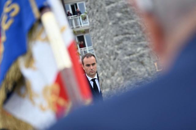 France's Prime Minister Sebastien Lecornu attends an International commemorative ceremony for the 82nd anniversary of the World War II "D-Day" Normandy landings in Langrune-sur-Mer, northwestern France, of June 6, 2026. (Photo by LOU BENOIST / AFP)