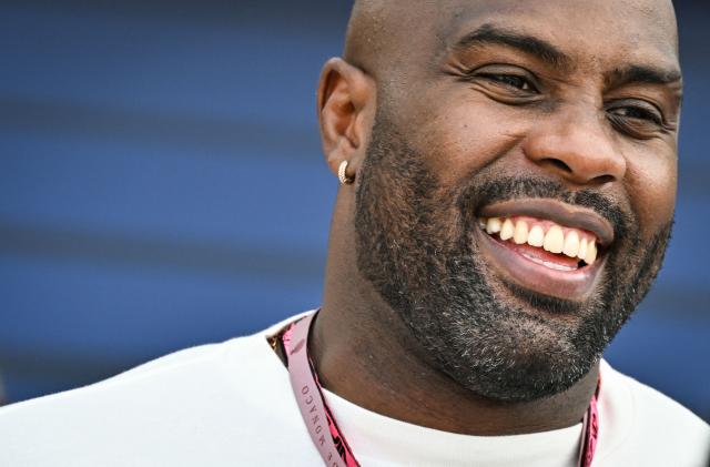 French judoka Teddy Riner react in the paddock after attending the qualifying session at the Monaco street circuit in Monaco, ahead of the Monaco Formula 1 Grand Prix, on June 6, 2026. (Photo by Andrej ISAKOVIC / AFP)