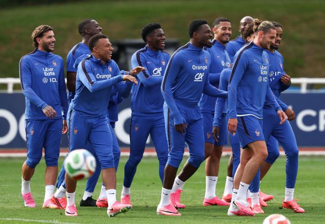 (From L) Fance's defender #19 Theo Hernandez,  France's forward #07 Ousmane Dembele, France's forward #10 Kylian Mbappe 0, France's forward #09 Marcus Thuram, France's midfielder #14 Adrien Rabiot, France's midfielder #13 Ngolo Kante and France's forward #12 Bradely Barcola react during a training session at the French Football Federation's (FFF) training ground in Clairefontaine-en-Yvelines, southwest of Paris on June 6, 2026, as part of the team's preparation for upcoming 2026 FIFA World Cup football tournament. (Photo by FRANCK FIFE / AFP)