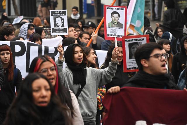 Demonstrators march against the human rights policies of Chile's President Jose Antonio Kast's government in Santiago on June 6, 2026. (Photo by RODRIGO ARANGUA / AFP)
