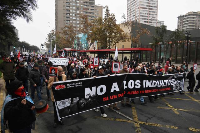 Demonstrators march against the human rights policies of Chile's President Jose Antonio Kast's government in Santiago on June 6, 2026. (Photo by RODRIGO ARANGUA / AFP)