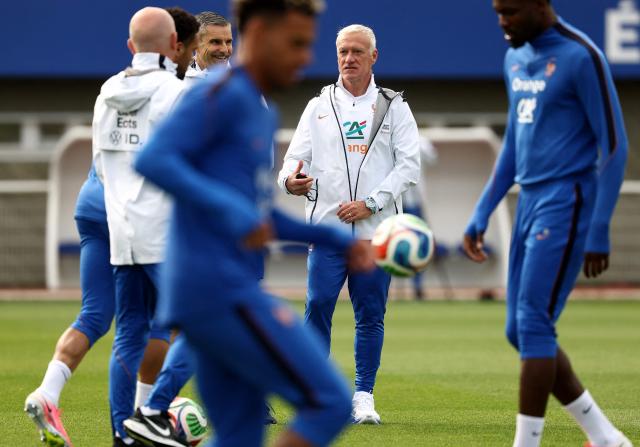 France's head coach Didier Deschamps (2nd/R) takes part in a training session at the French Football Federation's (FFF) training ground in Clairefontaine-en-Yvelines, southwest of Paris on June 6, 2026, as part of the team's preparation for upcoming 2026 FIFA World Cup football tournament. (Photo by FRANCK FIFE / AFP)