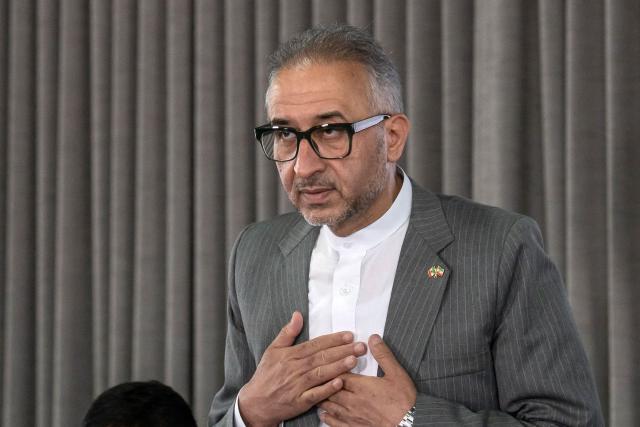 Iran's ambassador to Mexico Abolfazl Pasandideh gestures during a press conference ahead of the arrival of the national football team for the FIFA 2026 World Cup football tournament, in Tijuana, Baja California, Mexico on June 6, 2026, Iran lashed out at the United States for refusing visas to some of its squad support staff as the players were to leave Turkey for Mexico, just days before the June 11 start of the 2026 World Cup, which is being jointly hosted by the United States, Mexico and Canada. (Photo by Chris Noyola / AFP)