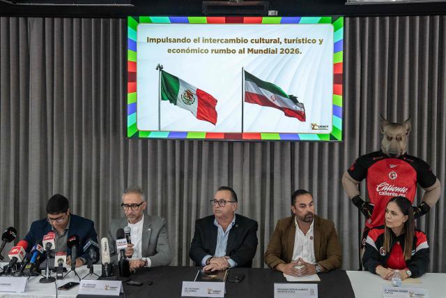 Iran's ambassador to Mexico Abolfazl Pasandideh (2nd L) attends a press conference ahead of the arrival of the national football team for the FIFA 2026 World Cup football tournament, in Tijuana, Baja California, Mexico on June 6, 2026, Iran lashed out at the United States for refusing visas to some of its squad support staff as the players were to leave Turkey for Mexico, just days before the June 11 start of the 2026 World Cup, which is being jointly hosted by the United States, Mexico and Canada. (Photo by Chris Noyola / AFP)