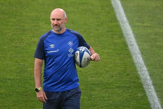 Castres' French head coach Xavier Sadourny walks on the pitch prior to the French Top 14 rugby union match between Castres Olympique and Rugby Club Toulonnais (Toulon)  at Stade Pierre Fabre in Castres, southern France on June 6, 2026. (Photo by Matthieu RONDEL / AFP)
