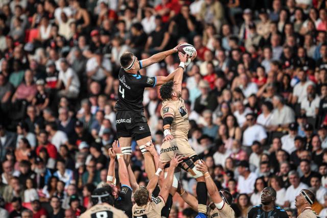 Montpellier’s French lock Florian Verhaeghe (top L) and Lyon's French flanker Dylan Cretin fight for the ball from a line-out during the French Top14 rugby union match between Lyon Olympique Universitaire Rugby and  Montpellier Herault Rugby at the Gerland Stadium in Lyon, central-eastern France on June 6, 2026. (Photo by OLIVIER CHASSIGNOLE / AFP)
