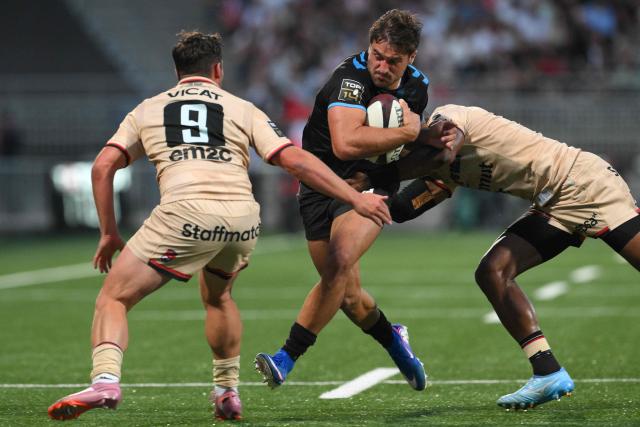 Montpellier’s French centre Auguste Cadot runs with the ball during the French Top14 rugby union match between Lyon Olympique Universitaire Rugby and  Montpellier Herault Rugby at the Gerland Stadium in Lyon, central-eastern France on June 6, 2026. (Photo by OLIVIER CHASSIGNOLE / AFP)