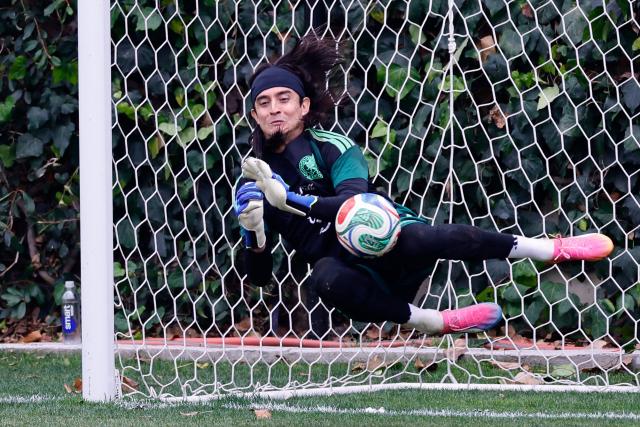 Mexico's goalkeeper Carlos Acevedo dives for the ball during a training session ahead of the FIFA 2026 World Cup at Centro de Alto Rendimiento in Mexico City on June 6, 2026. (Photo by Rodrigo Oropeza / AFP)