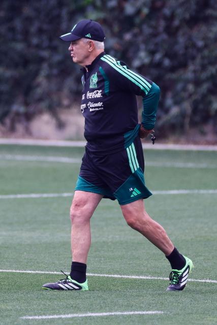 Mexico's head coach Javier Aguirre walks on the pitch during a training session ahead of the FIFA 2026 World Cup at Centro de Alto Rendimiento in Mexico City on June 6, 2026. (Photo by Rodrigo Oropeza / AFP)