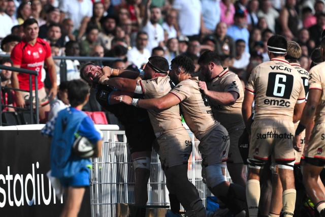 Montpellier’s French flanker Lenni Nouchi (2nd-L) fights with Lyon's French prop Jerome Rey (3rd-L) during the French Top14 rugby union match between Lyon Olympique Universitaire Rugby and  Montpellier Herault Rugby at the Gerland Stadium in Lyon, central-eastern France on June 6, 2026. (Photo by OLIVIER CHASSIGNOLE / AFP)