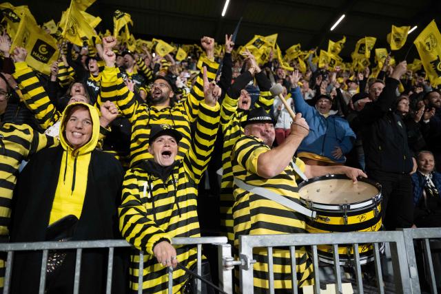 La Rochelle's supporters cheer for their team during the French Top14 rugby union match between Stade Rochelais (La Rochelle) and Stade Francais Paris at The Marcel-Deflandre Stadium in La Rochelle, western France on June 6, 2026. (Photo by XAVIER LEOTY / AFP)