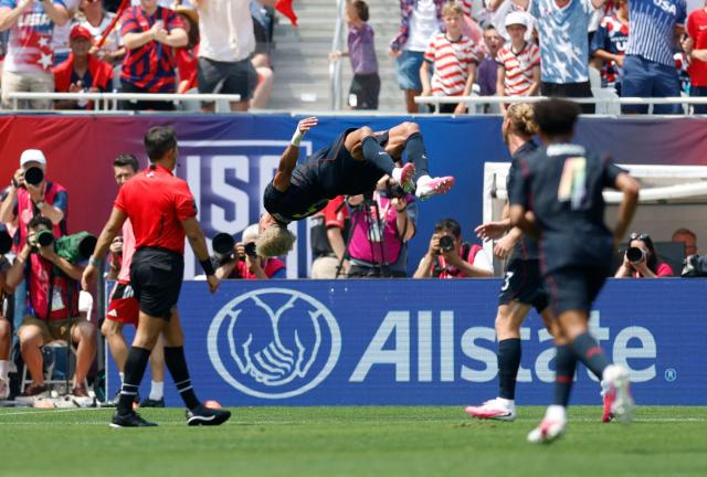 Antonee Robinson of the US celebrates scoring during the international friendly football match between USA and Germany at Soldier Field in Chicago, Illinois, on June 6, 2026. (Photo by KAMIL KRZACZYNSKI / AFP)