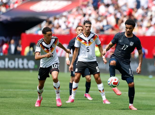 Malik Tillman of the US controls the ball during the international friendly football match between USA and Germany at Soldier Field in Chicago, Illinois, on June 6, 2026. (Photo by KAMIL KRZACZYNSKI / AFP)