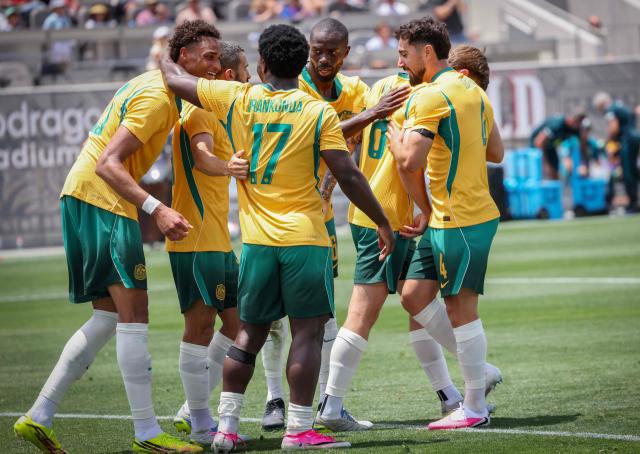 Australia celebrates after scoring a goal in the second half against Switzerland during the international friendly football match between Switzerland and Australia at Snapdragon Stadium in San Diego, California, on June 6, 2026. (Photo by SANDY HUFFAKER / AFP)