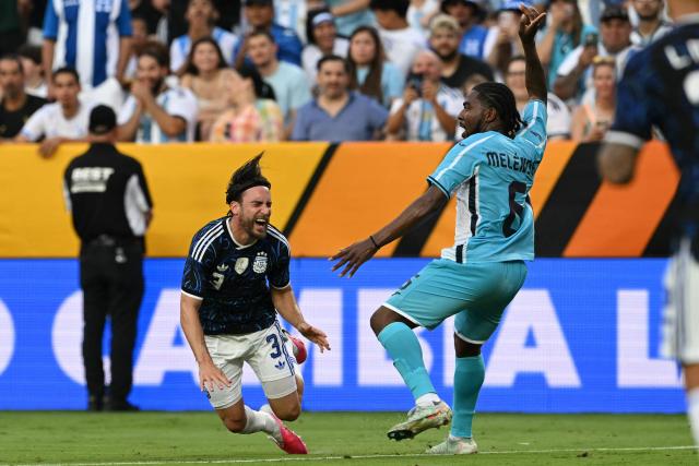 Argentina's defender #03 Nicolas Tagliafico reacts in pain during the international friendly football match between Argentina and Honduras at Kyle Field in College Station, Texas on June 6, 2026. (Photo by RONALDO SCHEMIDT / AFP)