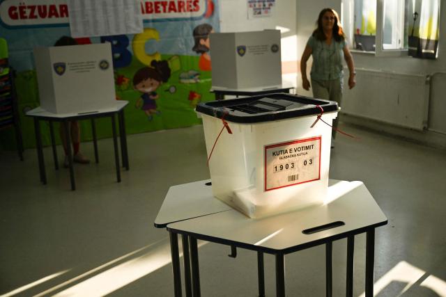 This photograph shows a ballot box at a polling station on the day of general elections in Pristina on June 7, 2026. Polls opened on June 7, 2026 for another snap election in Kosovo, its third in just over a year, as voter frustration mounts at a grinding political gridlock in Europe's youngest country, as the ballot comes after a polarised parliament failed to elect a president in April, deepening a political crisis that has gripped the country since inconclusive parliamentary elections in February 2025. (Photo by Armend NIMANI / AFP)