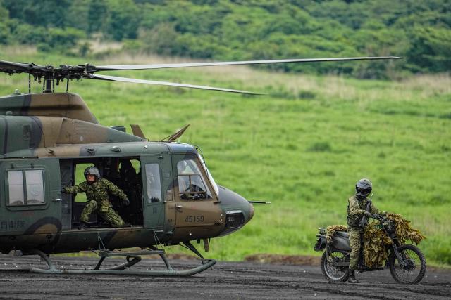 Japan Ground Self-Defense Force (JGSDF) soldiers take part in a live fire exercise at East Fuji Maneuver Area in Gotemba on June 7, 2026. (Photo by Yuichi YAMAZAKI / AFP)