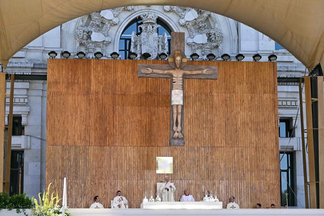 Pope Leo XIV leads the Holy Mass in the Plaza de Cibeles in Madrid on June 7, 2026. Pope Leo XIV is visiting Spain June 6-12 with stops in Madrid, Barcelona, and the Canary Islands, where he will meet with migrants and organisations dedicated to helping them. (Photo by Javier SORIANO / AFP)