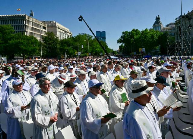 Priests attend the Holy Mass lead by Pope Leo XIV in the Plaza de Cibeles in Madrid on June 7, 2026. Pope Leo XIV is visiting Spain June 6-12 with stops in Madrid, Barcelona, and the Canary Islands, where he will meet with migrants and organisations dedicated to helping them. (Photo by Stefano RELLANDINI / AFP)