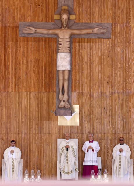 Pope Leo XIV leads the Holy Mass in the Plaza de Cibeles in Madrid on June 7, 2026. Pope Leo XIV is visiting Spain June 6-12 with stops in Madrid, Barcelona, and the Canary Islands, where he will meet with migrants and organisations dedicated to helping them. (Photo by Oscar DEL POZO / AFP)