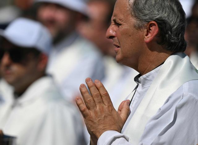 Priests attend the Holy Mass lead by Pope Leo XIV in the Plaza de Cibeles in Madrid on June 7, 2026. Pope Leo XIV is visiting Spain June 6-12 with stops in Madrid, Barcelona, and the Canary Islands, where he will meet with migrants and organisations dedicated to helping them. (Photo by Javier SORIANO / AFP)