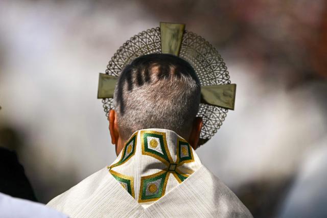 Pope Leo XIV walks along Alcala Street during the Corpus Christi procession following the Holy Mass held in the Plaza de Cibeles in Madrid on June 7, 2026. Pope Leo XIV is visiting Spain June 6-12 with stops in Madrid, Barcelona, and the Canary Islands, where he will meet with migrants and organisations dedicated to helping them. (Photo by Javier SORIANO / AFP)