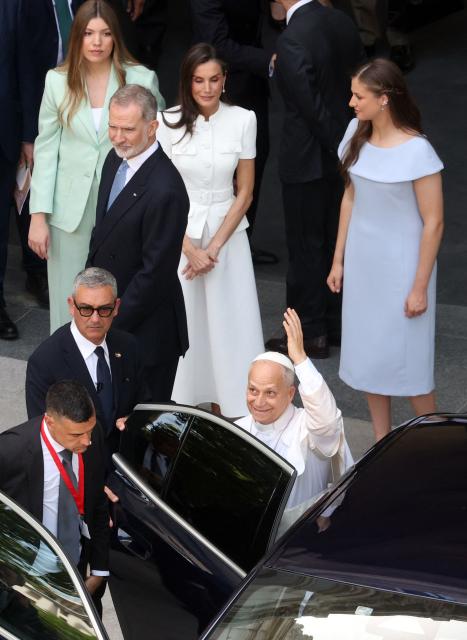 Pope Leo XIV waves as he leaves accompanied by the Spanish Royal Family after leading the Holy Mass in the Plaza de Cibeles in Madrid on June 7, 2026. Pope Leo XIV is visiting Spain June 6-12 with stops in Madrid, Barcelona, and the Canary Islands, where he will meet with migrants and organisations dedicated to helping them. (Photo by Pierre-Philippe MARCOU / AFP)