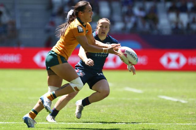 Australia's Madison Ashby passes the ball during the HSBC SVNS World Championship women's rugby sevens semi-final match between the United States and Australia at the Atlantique Bordeaux Metropole Stadium in Bordeaux, southwestern France, on June 7, 2026. (Photo by ROMAIN PERROCHEAU / AFP)