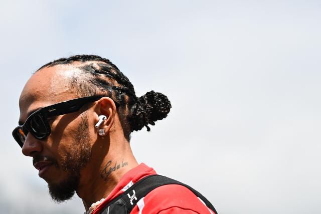 Ferrari's British driver Lewis Hamilton arrives in the paddock ahead of the Monaco Formula 1 Grand Prix at the Monaco street circuit in Monaco, ahead of the, on June 7, 2026. (Photo by Andrej ISAKOVIC / AFP)