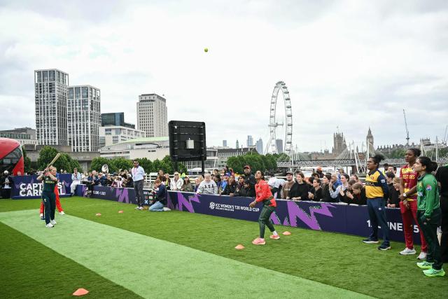 Australia’s Sophie Molineux (far L) plays a shot during an exhibition at The Captains' Carnival, the activation event for the ICC Women's T20 cricket world cup 2026, in central London on June 7, 2026. (Photo by JUSTIN TALLIS / AFP)