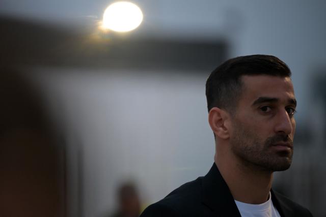 Iran's captain and defender Ehsan Haji Safi gestures on arrival at the Tijuana International Airport in Tijuana, Mexico on June 7, 2026, ahead of the FIFA 2026 World Cup football tournament. (Photo by Guillermo Arias / AFP)