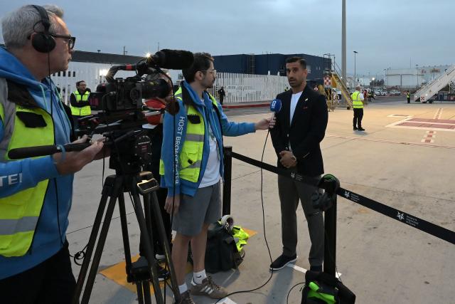 Iran's captain and defender #03 Ehsan Haji Safi speaks with the press on arrival at the Tijuana International Airport in Tijuana, Mexico on June 7, 2026, ahead of the FIFA 2026 World Cup football tournament. (Photo by Guillermo Arias / AFP)