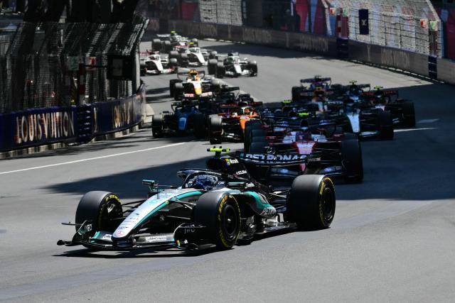 Mercedes' Italian driver Kimi Antonelli (C) leads the start during Monaco Formula 1 Grand Prix at the Monaco street circuit in Monaco, ahead of the, on June 7, 2026. (Photo by Andrej ISAKOVIC / AFP)