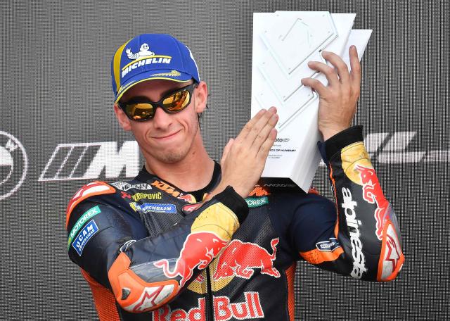 Team Red Bull KTM Factory Racing's Pedro Acosta celebrates with the trophy after the Hungarian Motorcycle MotoGP Grand Prix at the Balaton Park circuit in Balatonfokajar, Hungary, on June 7, 2026. (Photo by Ferenc ISZA / AFP)