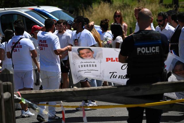Relatives and local elected officials prepare to take part in a silent march in tribute to Lyhanna, an 11-year-old girl found dead on June 4 after having been reported missing since May 29, in Fleurance, southwestern France, on June 7, 2026. Outrage has erupted in France after it emerged the main suspect Jerome.B, a 41-year-old father of two, had been repeatedly accused of sexually abusing children but no action was taken to protect others. The inscription on the jerseys reads : "Never again !". (Photo by Lionel BONAVENTURE / AFP)