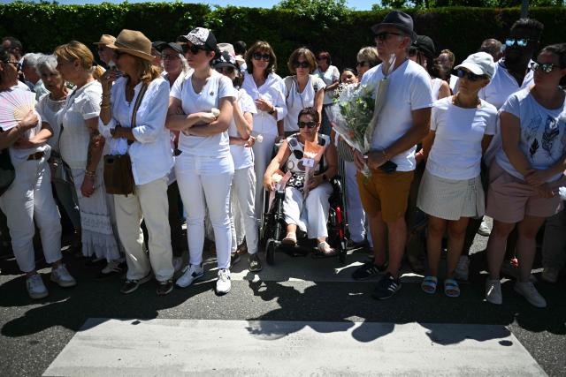 People get ready to take part in a silent march in tribute to Lyhanna, an 11-year-old girl found dead on June 4 after having been reported missing since May 29, 2026, in Fleurance, southwestern France, on June 7, 2026. Outrage has erupted in France after it emerged the main suspect Jerome.B, a 41-year-old father of two, had been repeatedly accused of sexually abusing children but no action was taken to protect others. The inscription on the jerseys reads : "Never again !". (Photo by Lionel BONAVENTURE / AFP)