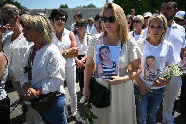 People take part in a silent march in tribute to Lyhanna, an 11-year-old girl found dead on June 4 after having been reported missing since May 29, 2026, in Fleurance, southwestern France, on June 7, 2026. Outrage has erupted in France after it emerged the main suspect Jerome.B, a 41-year-old father of two, had been repeatedly accused of sexually abusing children but no action was taken to protect others. The inscription on the jerseys reads : "Never again !". (Photo by Lionel BONAVENTURE / AFP)