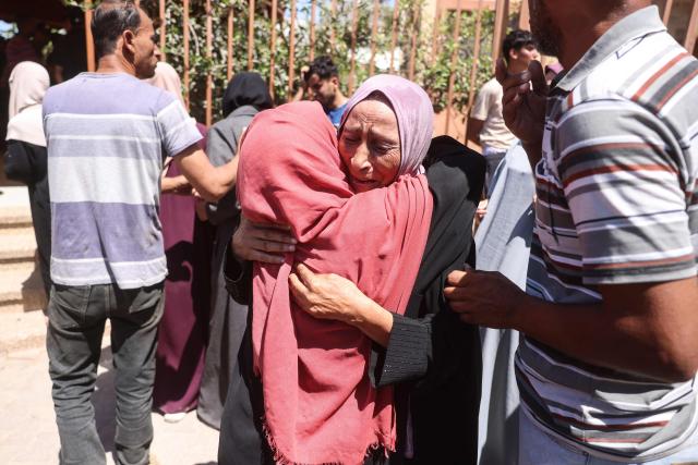 Women mourn victims killed in a reported Israeli airstrike on a police station in the Al-Mawasi district, during a funeral at Nasser Hospital in Khan Yunis, southern Gaza Strip, on June 7, 2026. Gaza's civil defence service said an Israeli airstrike on a police station killed at least five people on June 7, and wounded several, as violence raged unabated across the Palestinian territory. Israel and Hamas continue to trade accusations of near-daily ceasefire violations, keeping the Gaza Strip locked in bloodshed months after a truce took effect in October. (Photo by Bashar Taleb / AFP)