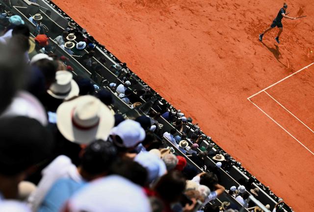 Germany's Alexander Zverev plays a forehand return to Italy's Flavio Cobolli during their men's final singles match on day 15 of the French Open tennis tournament on Court Philippe-Chatrier at the Roland-Garros Complex in Paris on June 7, 2026. (Photo by JULIEN DE ROSA / AFP)