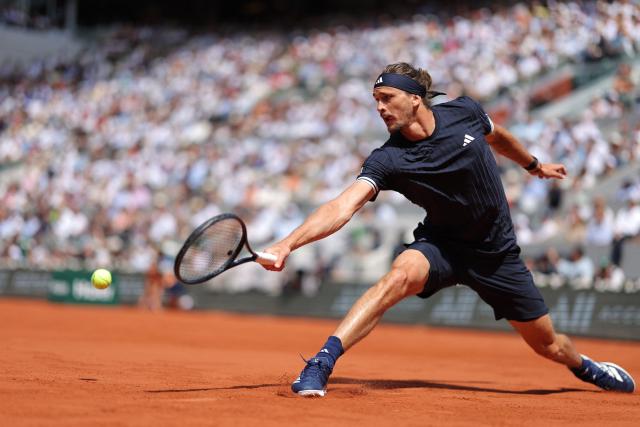 Germany's Alexander Zverev plays a backhand return to Italy's Flavio Cobolli during their men's final singles match on day 15 of the French Open tennis tournament on Court Philippe-Chatrier at the Roland-Garros Complex in Paris on June 7, 2026. (Photo by Thomas SAMSON / AFP)