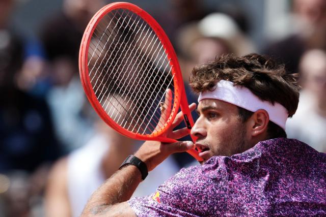 Italy's Flavio Cobolli plays against Germany's Alexander Zverev during their mens final singles match on day 15 of the French Open tennis tournament on Court Philippe-Chatrier at the Roland-Garros Complex in Paris on June 7, 2026. (Photo by Dimitar DILKOFF / AFP)