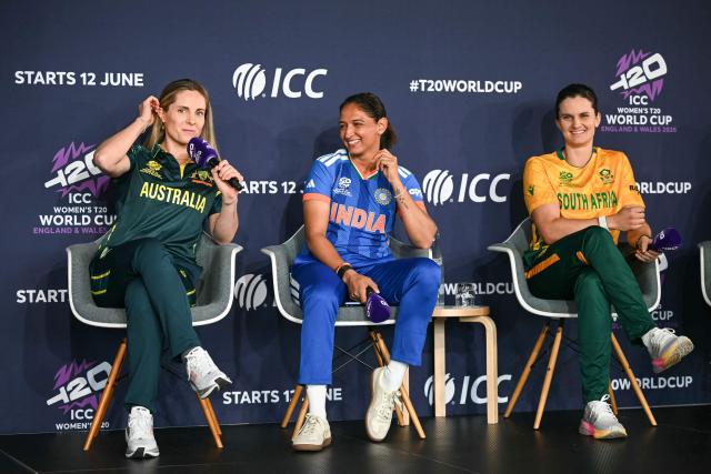 Australia’s Sophie Molineux (L), India’s Harmanpreet Kaur (C) and South Africa’s Laura Wolvaardt (R) speak as part of The Captains' Carnival, the activation event for the ICC Women's T20 cricket world cup 2026, in central London on June 7, 2026. (Photo by JUSTIN TALLIS / AFP)